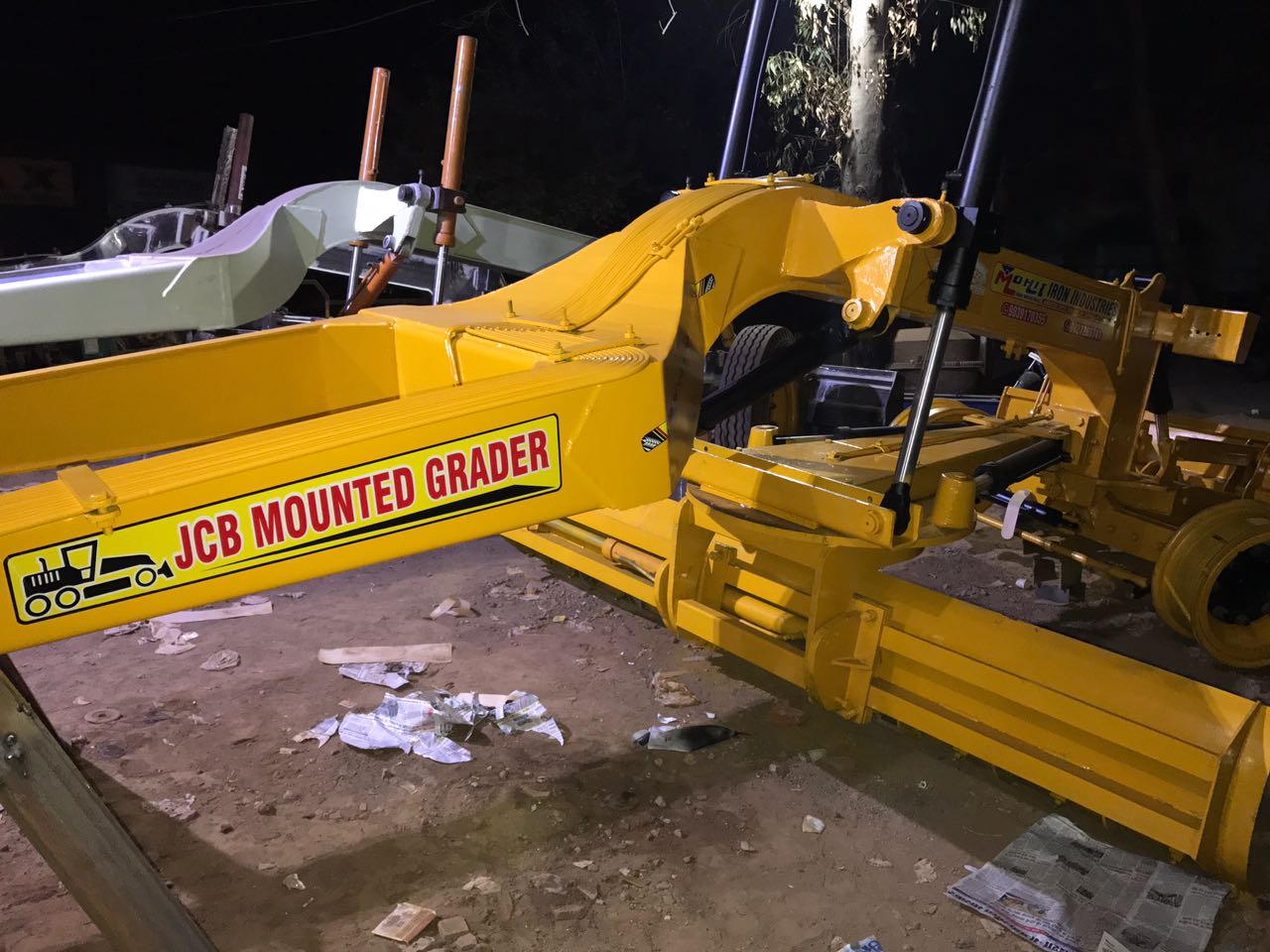 JCB mounted grader